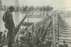 US engineers constructing a bridges across river Seine.