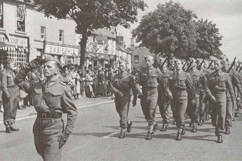 Polish troops march through an English town during the summer of 1940