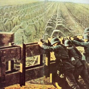 German soldiers are closing a door between the tank traps of the Siegfried Line