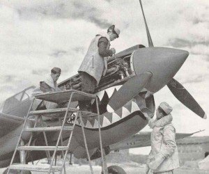 Chinese ground crew work on a Curtiss P-40 