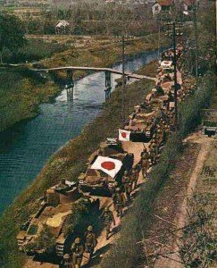 Japanese Type 89 medium tanks and infantry advancing 