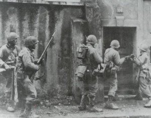 Us soldiers check houses at Metz for enemy 'stay-behinds'.