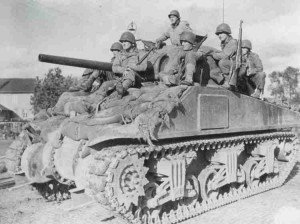M4 Sherman gives ride to GIs