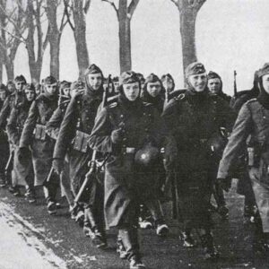 German infantry company is marching behind the Siegfried Line