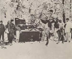 Finnish soldiers with a captured Russian tank