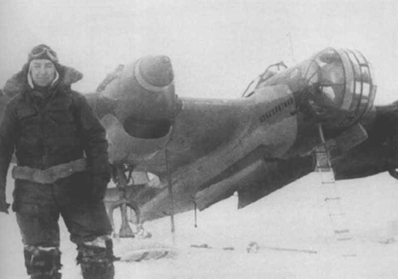 Russian pilot in front of his Tupolev SB-2 bomber.