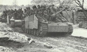 StuG III with mounted infantry 