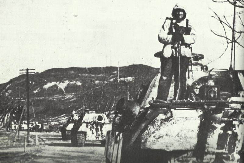 Column of King Tiger tanks