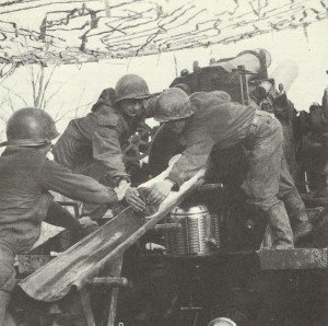 US artillery bombarding German positions 