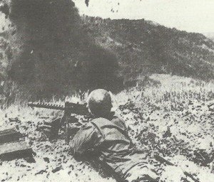 US infantry of 38th Division blast Japanese positions