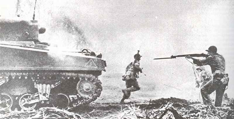 US Marine takes aim with his M1 Garand at Iwo Jima