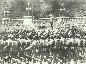 Emperor Hirohito reviews parade