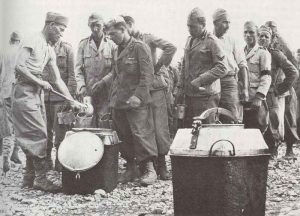 Italian POW's wearing the uniform of the fascist MVSN militia 