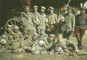  German POWs posing with one of their  French guards for the camera.