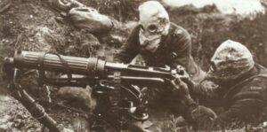 British Vickers machine-gun crew with 'Hypo Helmets'.