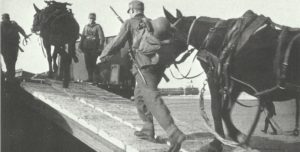 German mountain troops practice loading onto landing craft