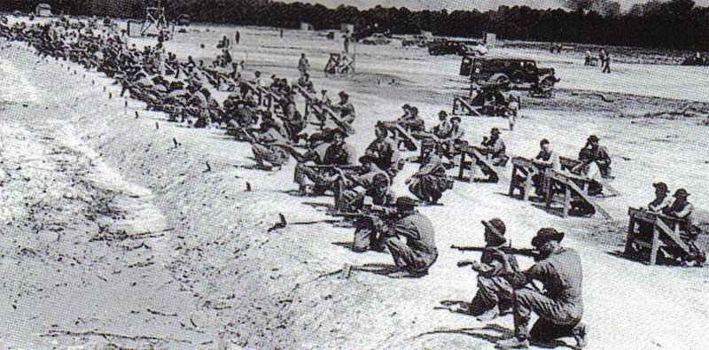 US Soldiers in dungarees fire M1903 Springfields