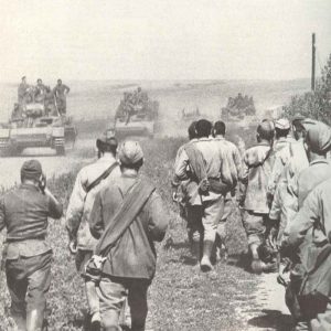 German tanks advancing, Russian PoW's flow back