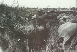 British machine-gunner firinig his Lewis Gun