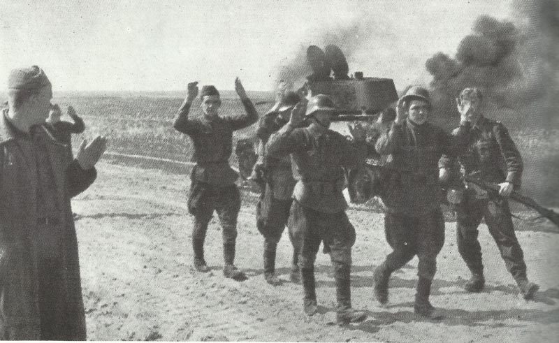 crew of a knocked-out Russian T-34 tank surrenders