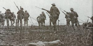 British infantry attacking through barbed wire