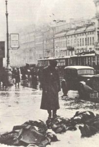 Starving civilians on the streets of Leningrad. 