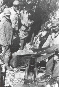 Loading an Italian  58mm trench mortar