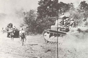 Japanese light tanks with infantry are advancing towards Manila
