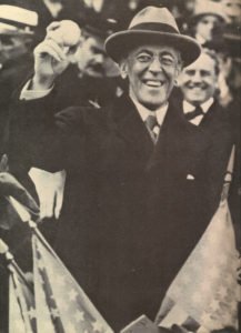 US President Wilson holding a baseball at a World series match