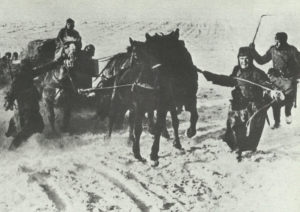 supplies with horses through the deep snow in Russia