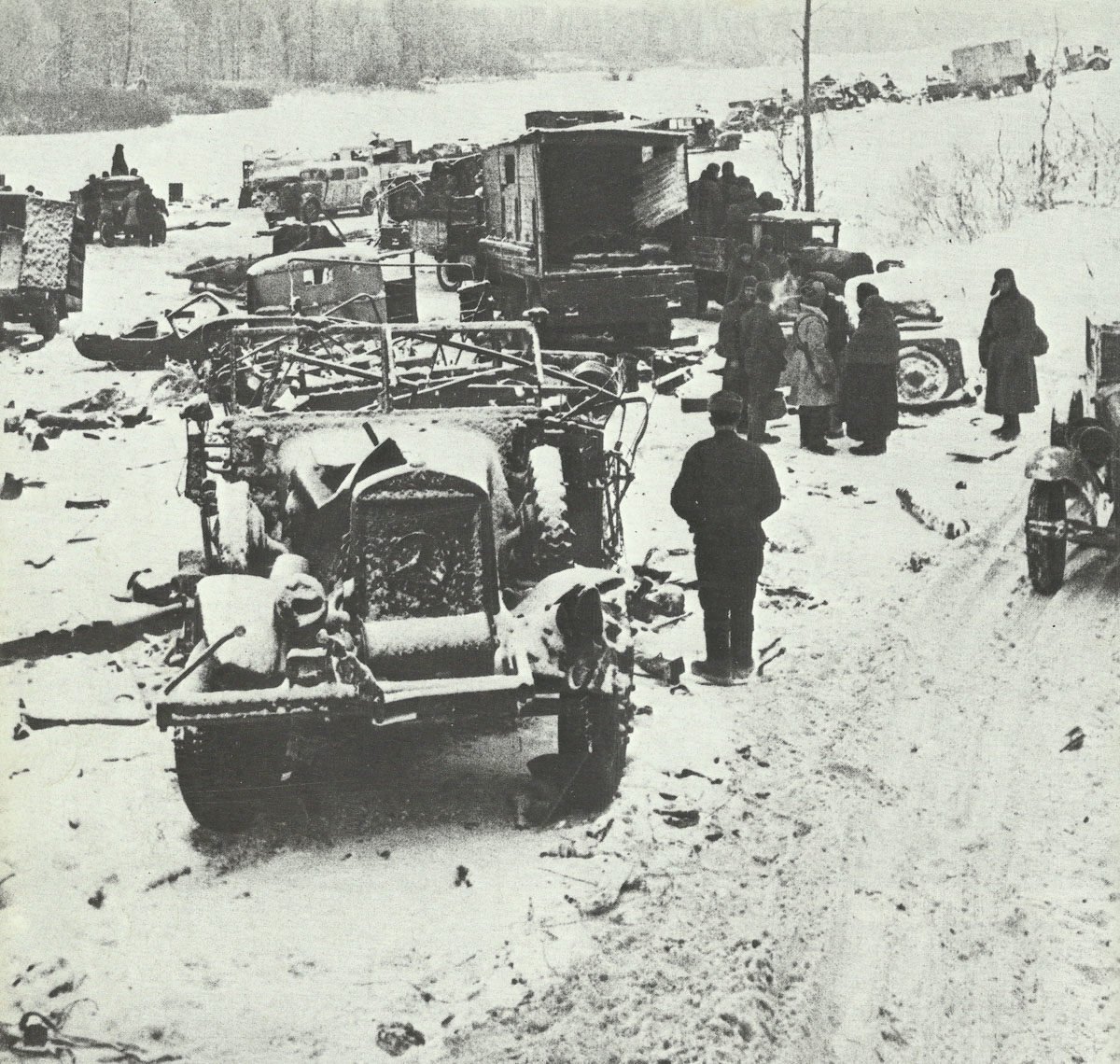 Russians search the remains of a German column