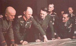 Hitler confers with his leading generals and Mussolini
