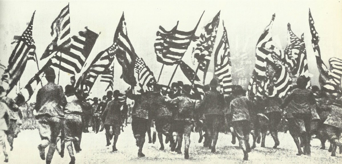 enthusiasim and waving flags on the Broadway