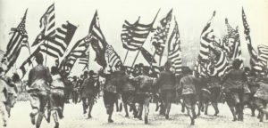 enthusiasim and waving flags on the Broadway 