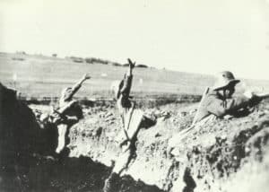 throwing hand grenades out of the trench