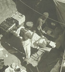 wounded British soldier receives medical treatment 