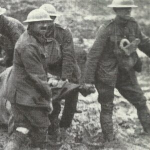 Stretcher-bearers in mud of Ypres