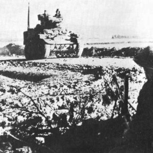 Stuart tank and British infantry in Tunisia.