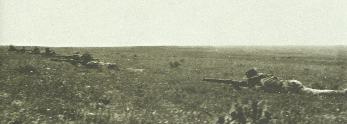 Dismounted Australian mounted infantrymen open fire