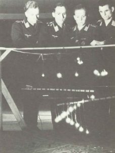 German pathfinder bomber crew exercising on a model of a British city. 