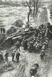 British soldiers gather at a plug-in tank.