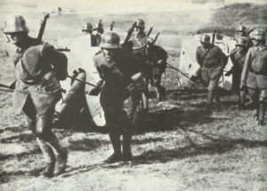 German gunners pull field guns 