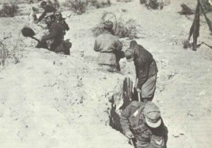 Italian soldiers digging out trenches