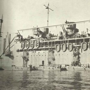 soldiers are climbing from the attack transport McCawley in landing crafts