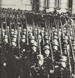 A parade of SS formations in black uniform in the pre-war period.