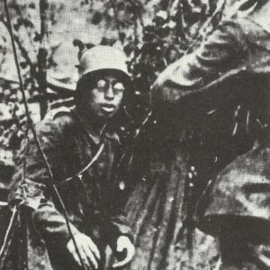 Bespectacled German soldier surrenders