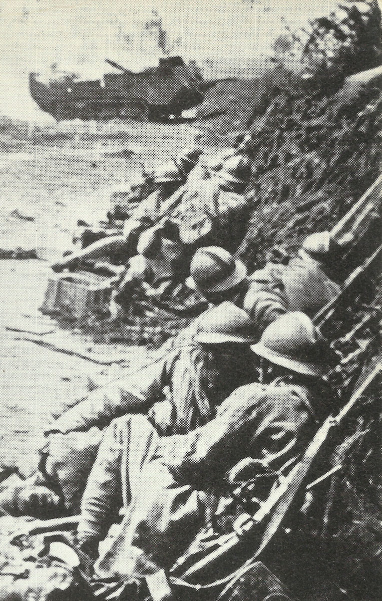 French troops take cover