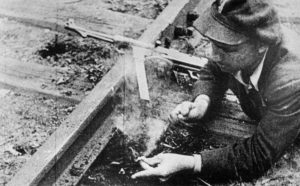 Partisan prepares the blow up of a railroad