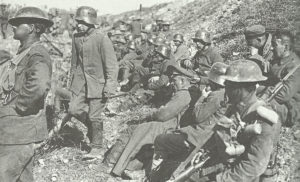 Canadian soldiers with captured Germans 