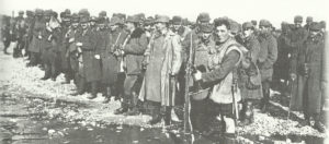 British soldier guards a group of Austro-Hungarian PoWs